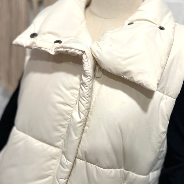 InVESTed Puffer Vest