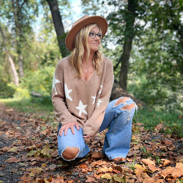 taupe brown long sleeve sweater with white stars